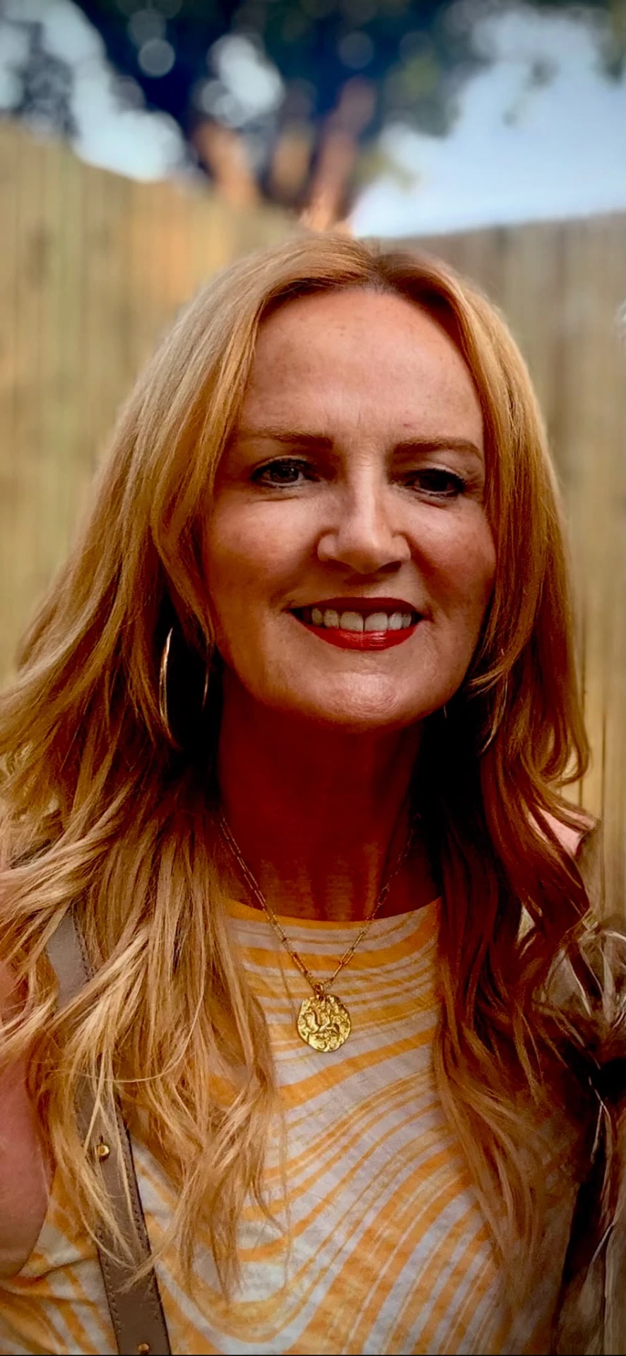Portrait of Jayne Crowley smiling outdoors