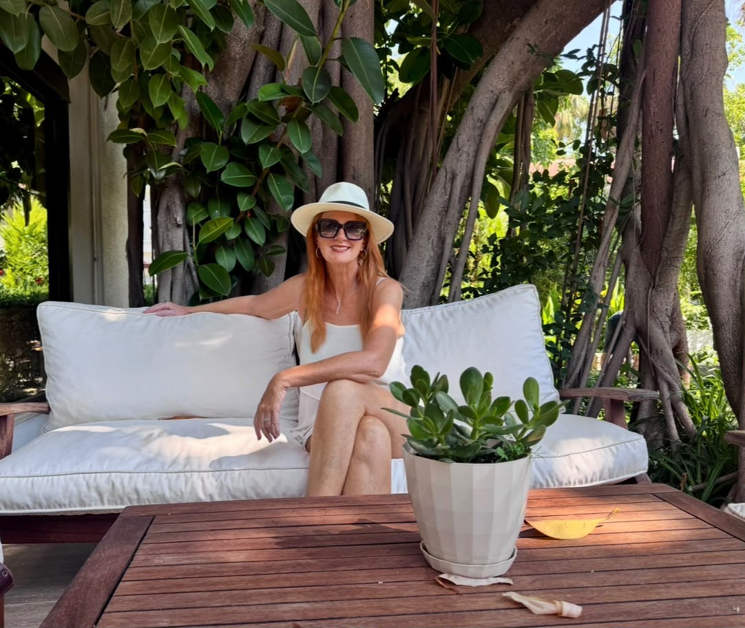 Jayne Crowley relaxing in a garden